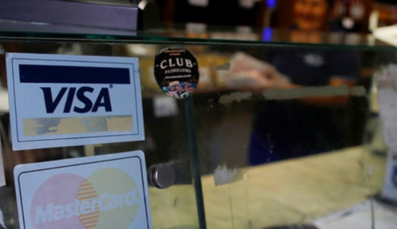 Visa и MasterCard накажут за Венесуэлу